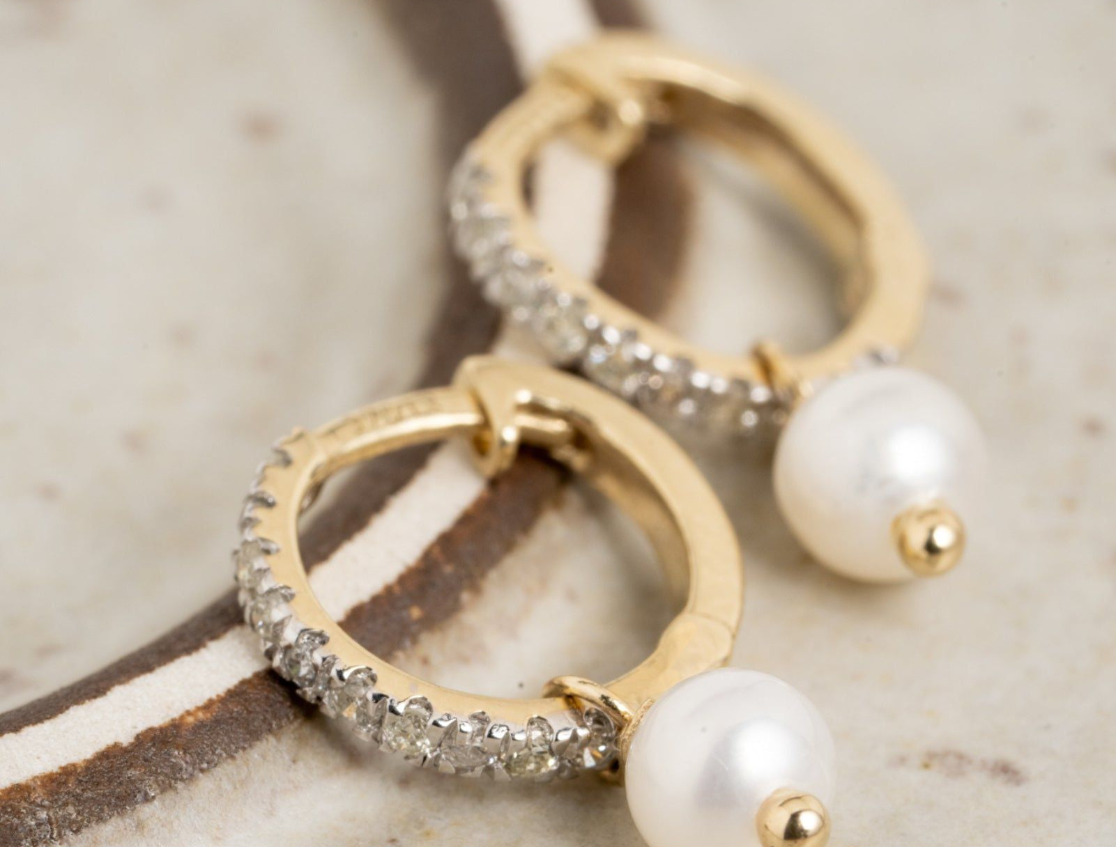 Picture of  Luna Rae solid 9k gold Adeline Huggies in Solid 9K Gold with Diamonds & Freshwater Pearls